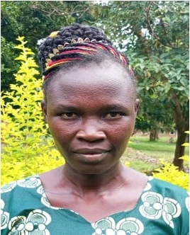 A teacher interacting with children in a classroom